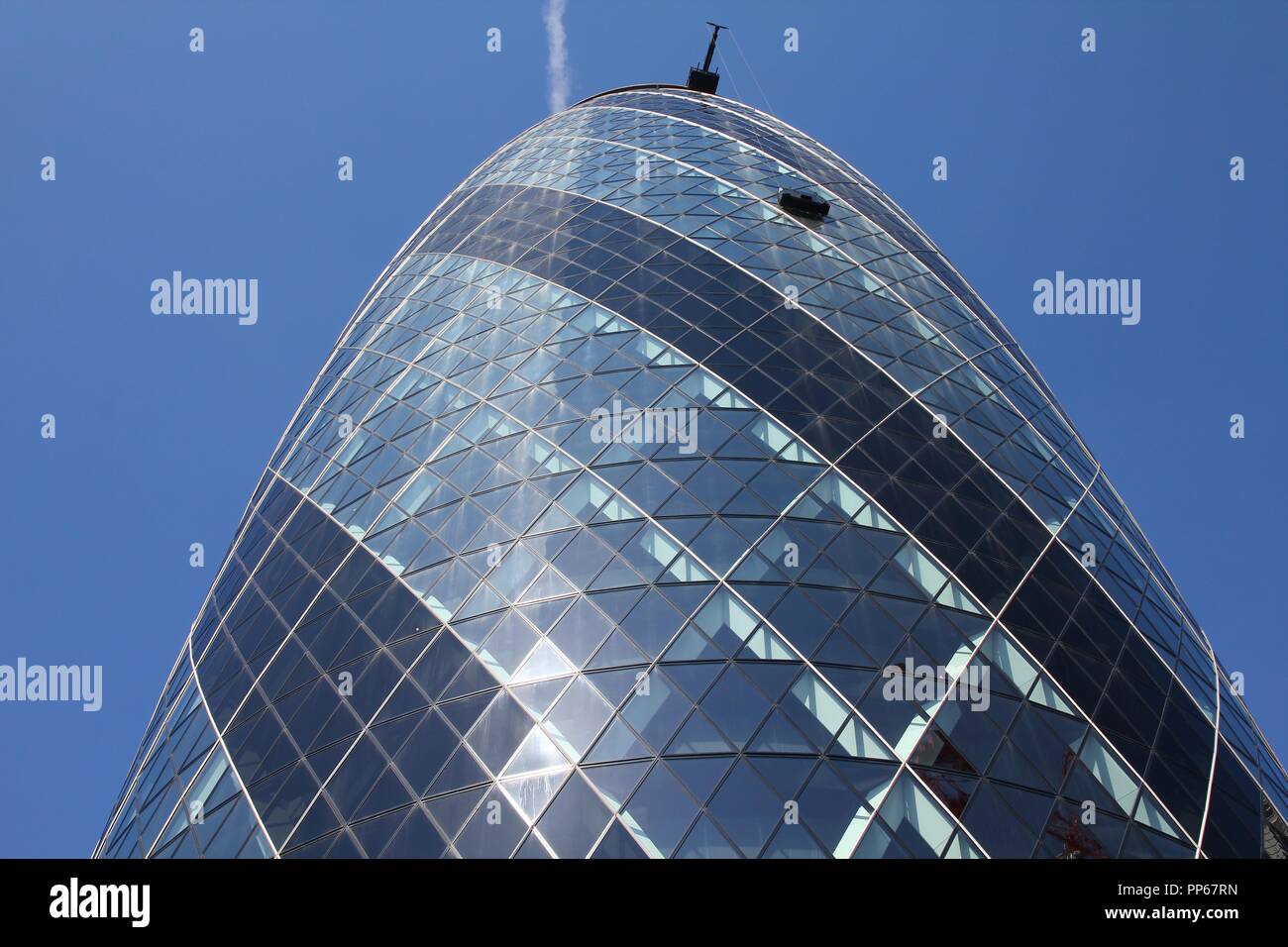 LONDON, UK - MAY 13, 2012: View of 30 St Mary Axe building in London. It was built in 2003 and is among top 10 tallest London buildings (180m tall). Stock Photo