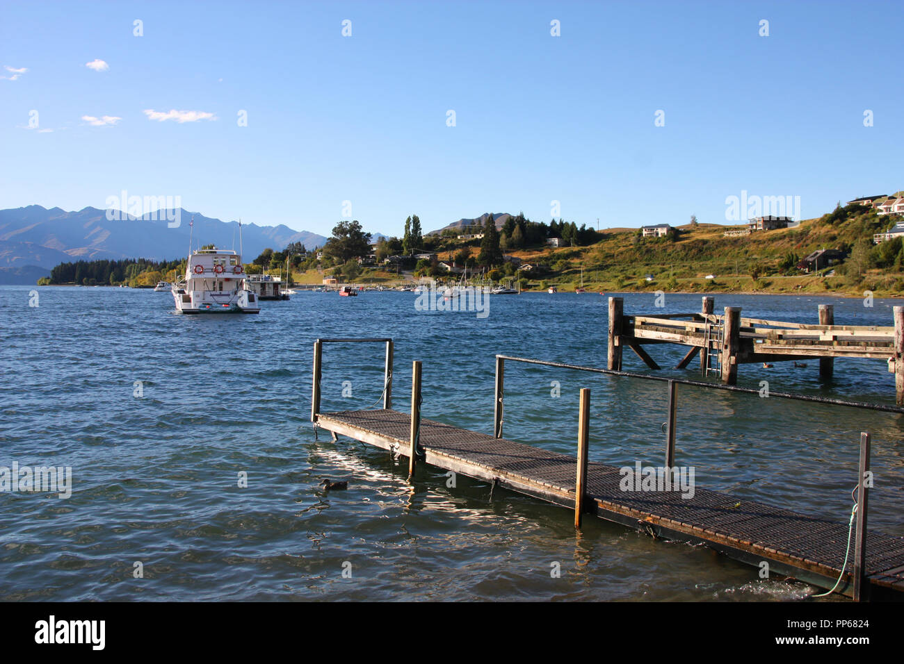 Lake Wanaka in Otago region of New Zealand. Beautiful peaceful morning landscape. Stock Photo