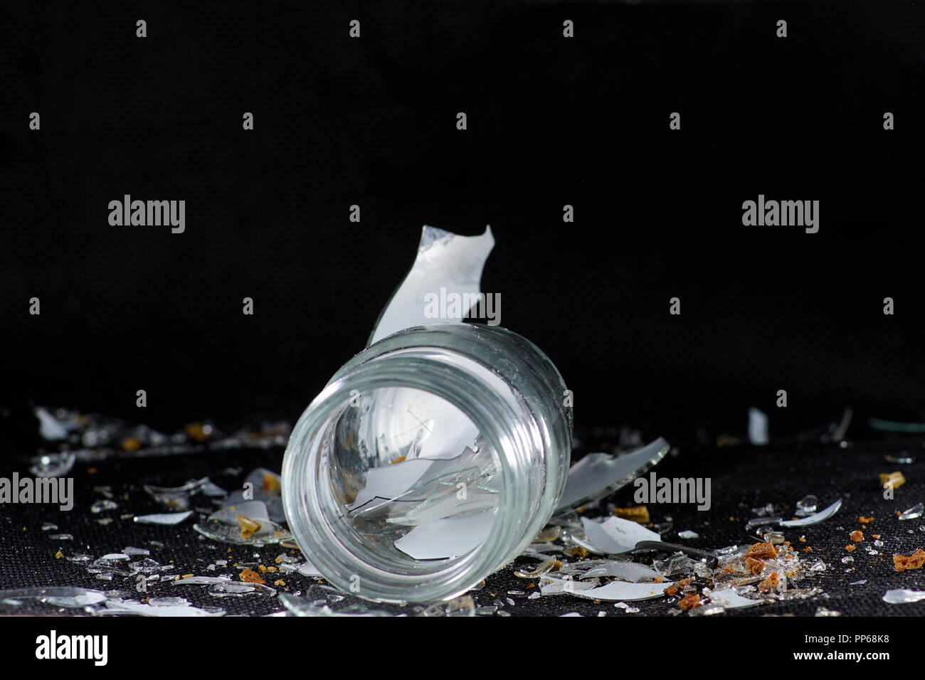 Shot in studio on glass against black background with flash light. Stock Photo