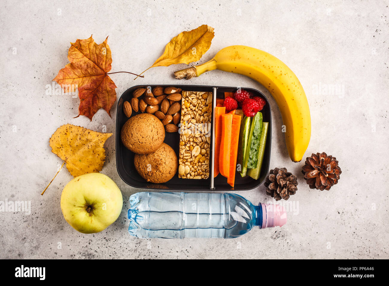 https://c8.alamy.com/comp/PP6A46/healthy-meal-prep-containers-with-cereal-bar-fruits-vegetables-and-snacks-takeaway-food-on-white-background-top-view-lunch-box-to-school-PP6A46.jpg
