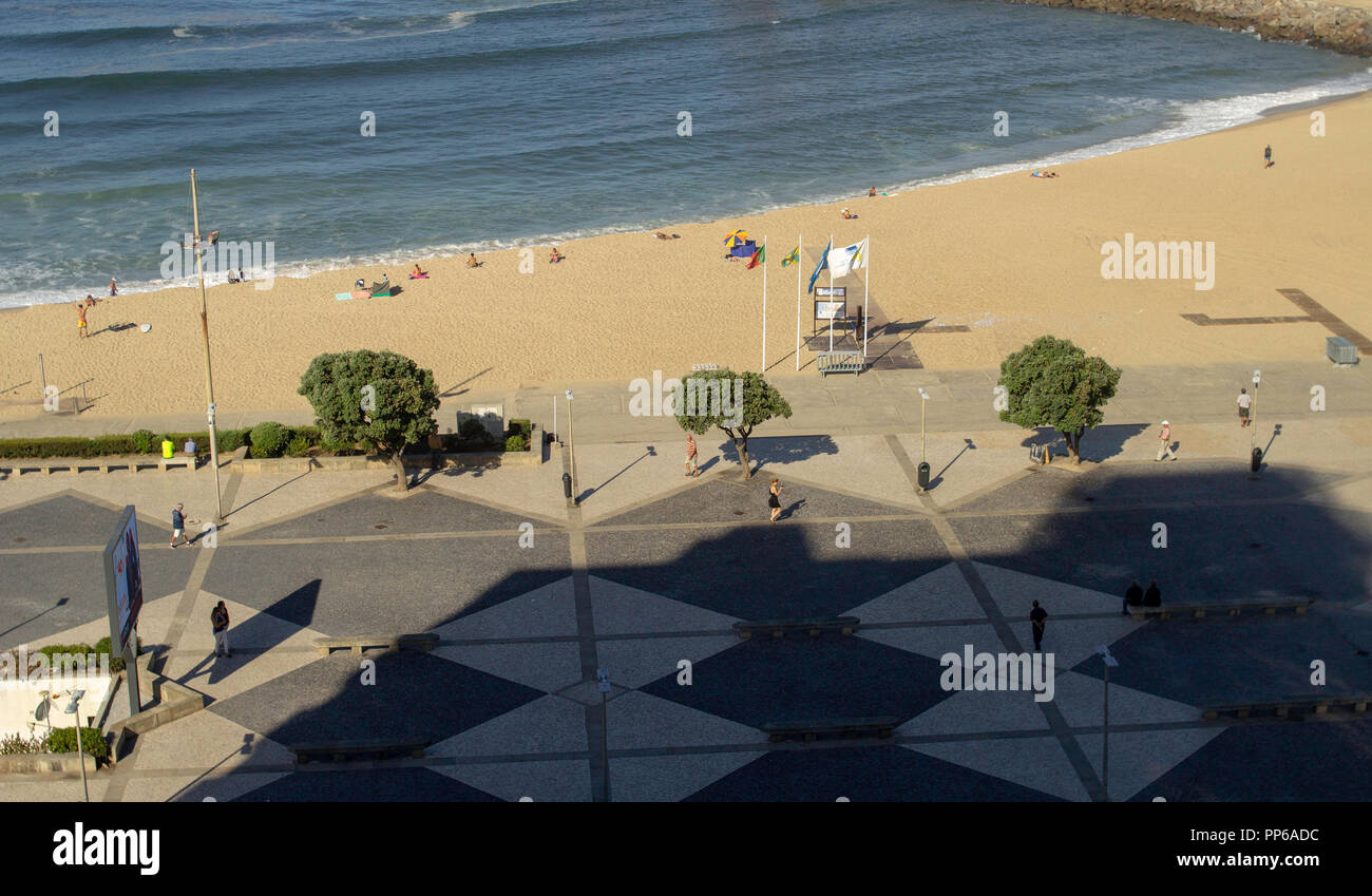 Espinho, Portugal. A view of the promenade and beach in Espinho, Portugal. Stock Photo