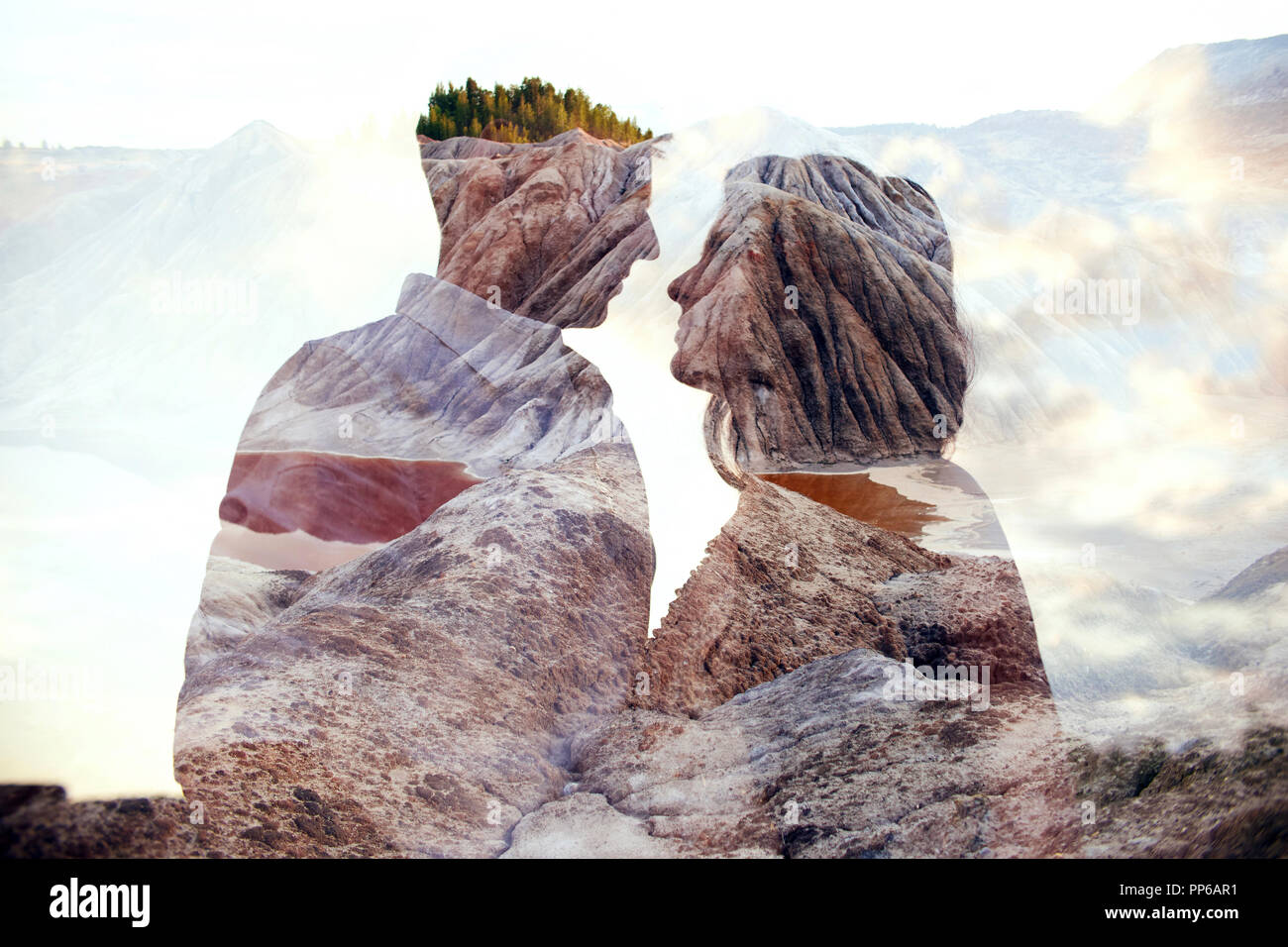 Double exposure man and woman couple hugging with mountains in ...