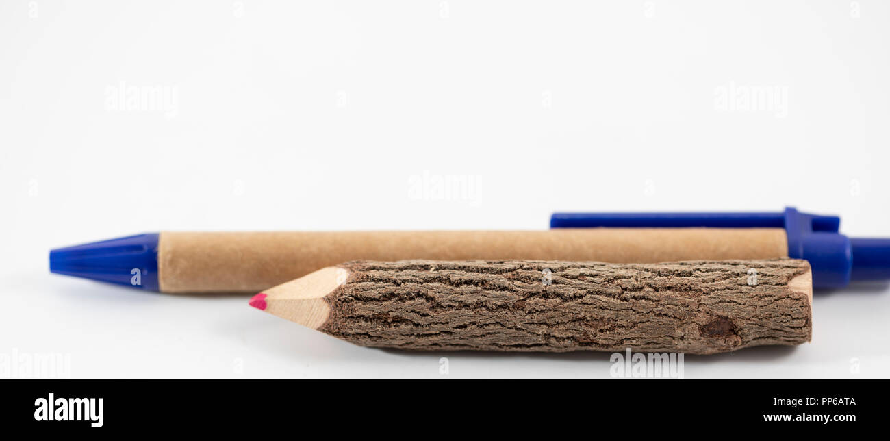 wooden pencil and brown pen on the white background Stock Photo - Alamy