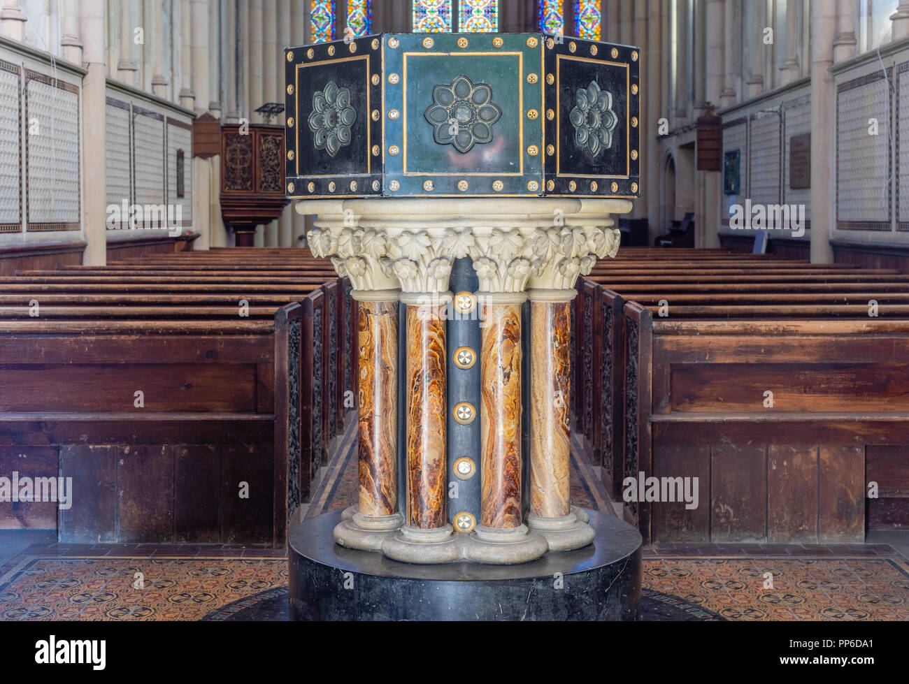The 13th century baptismal font made of marble inside the St Mary's church Itchen Stoke in New Alresford, Hampshire, England, UK Stock Photo