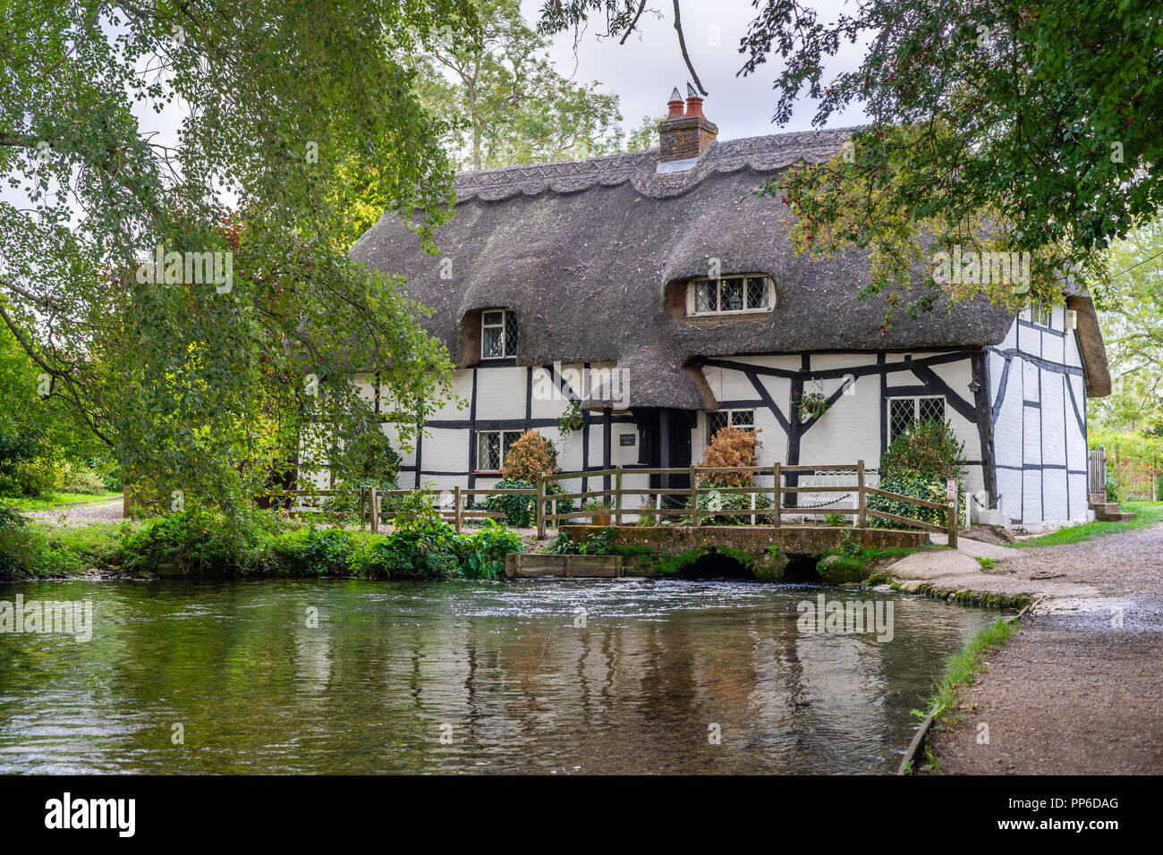 The Fulling Mill along the River Alre in Alresford during summer 2018, Hampshire, England, UK Stock Photo