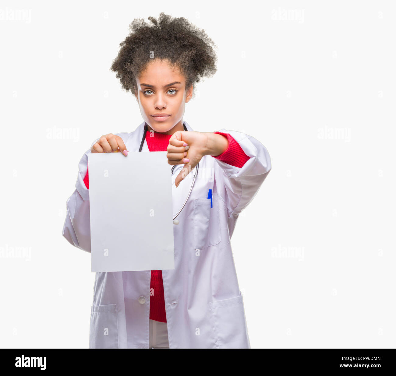 Young afro american doctor woman holding blank paper over isolated ...