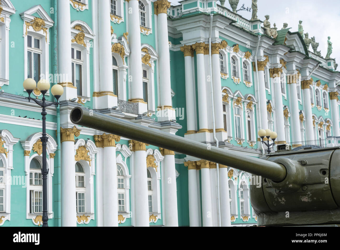 The barrel of Soviet tank T-34 close-up on background of the Winter Palace in St. Petersburg. Stock Photo