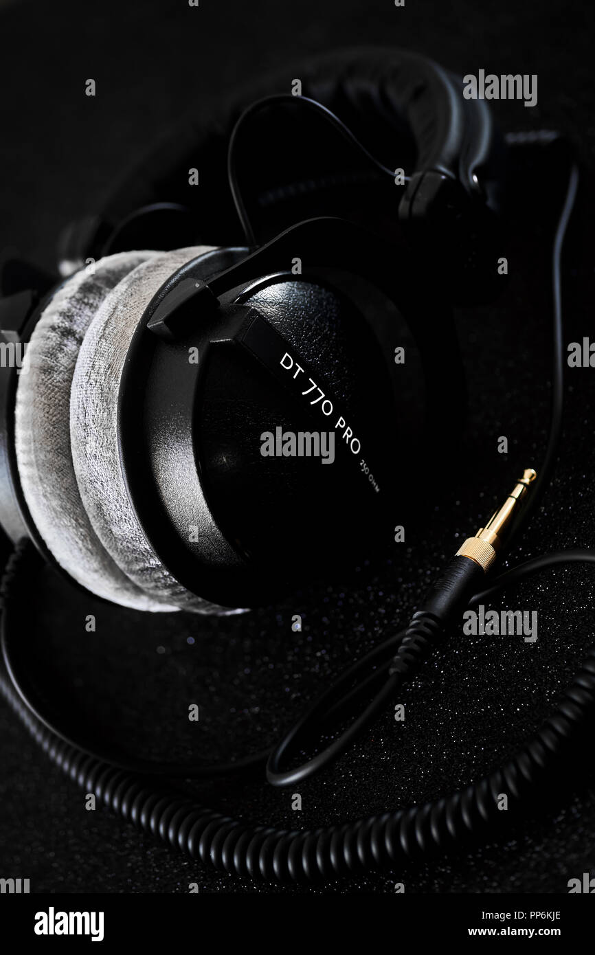 Beyerdynamic circumaural head phones over black background, for mixing, mastering, monitoring (closed) close up, nobody. Most popular and professional Stock Photo