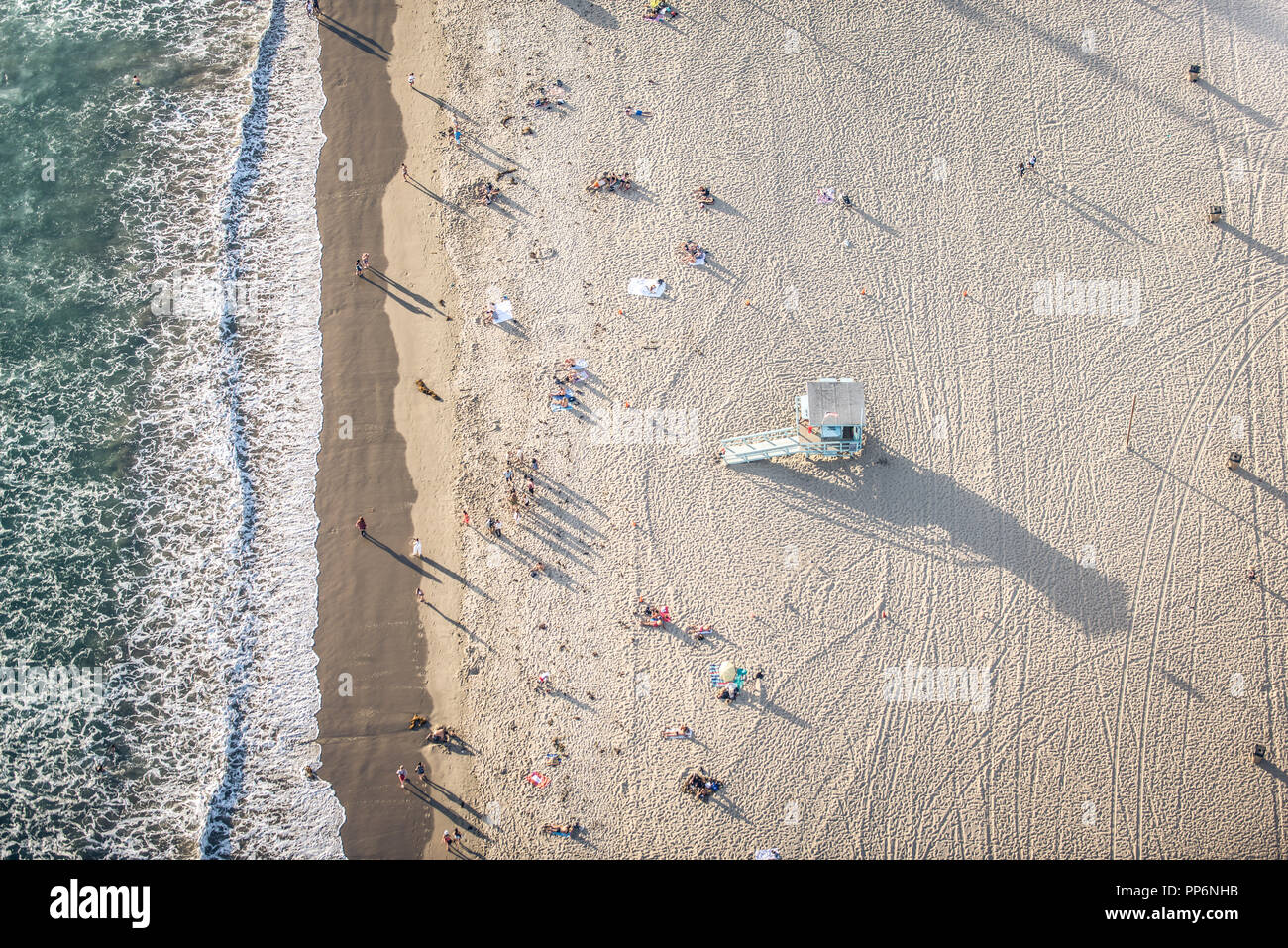 Santa Monica beach, drone view - People sunbathing on the beach and  swimming in the ocean Stock Photo - Alamy