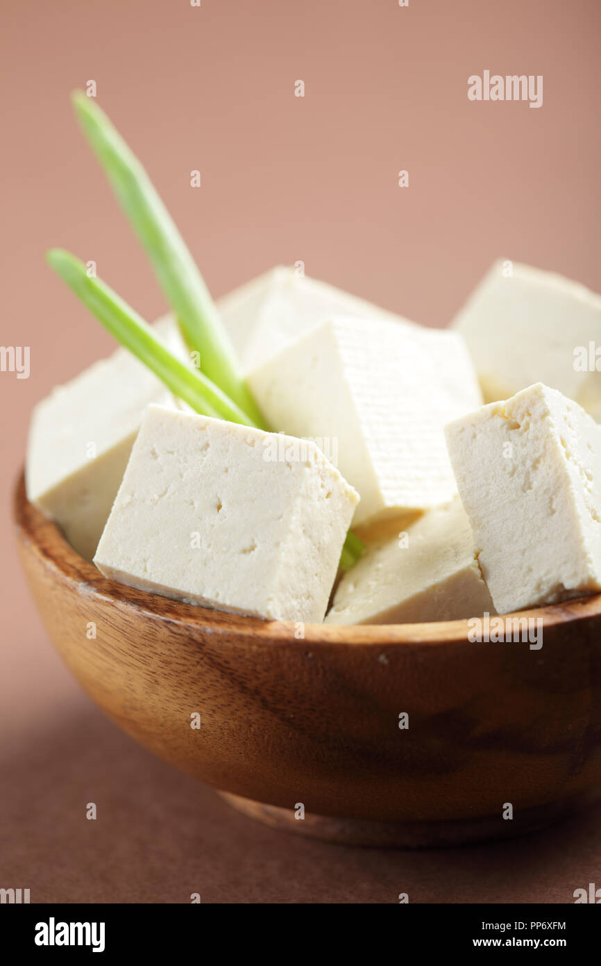 Sliced tofu in the wooden bowl Stock Photo