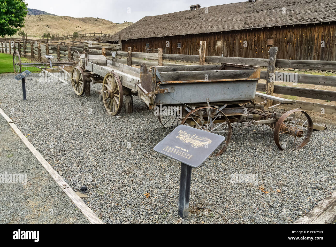 Old wooden cart and dump wagon at the Cant Ranch in John Day Fossil Beds National Monument, Dayville, Central Oregon, USA. Stock Photo