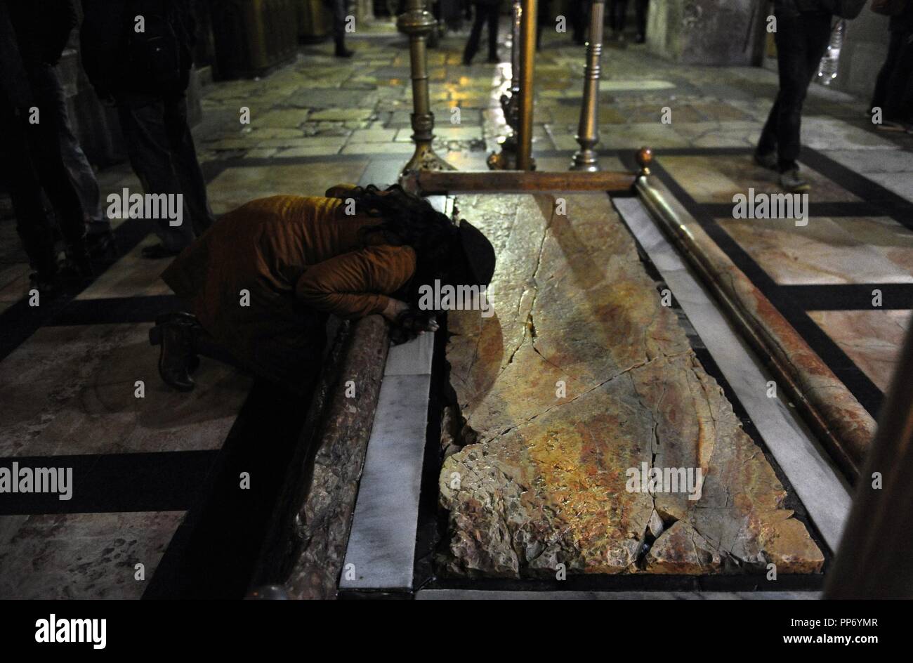 Israel. Jerusalem. Church of the Holy Sepulchre. Stone of the Anointing or Unction, where Nicodemus and Joseph of Arimathea prepared the body of Jesus for burial. Old City. Stock Photo