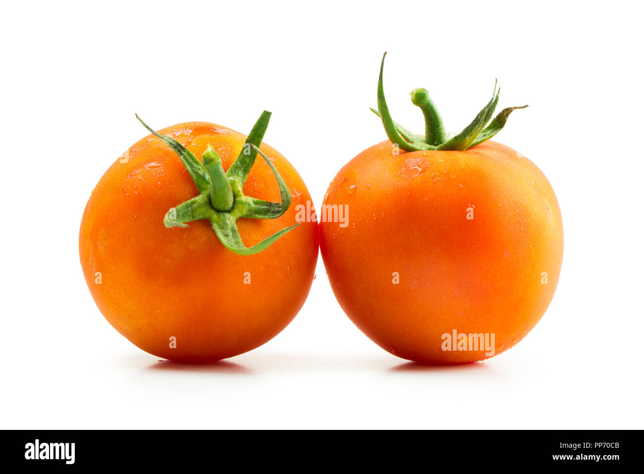 Fresh tomatoes on white background Stock Photo