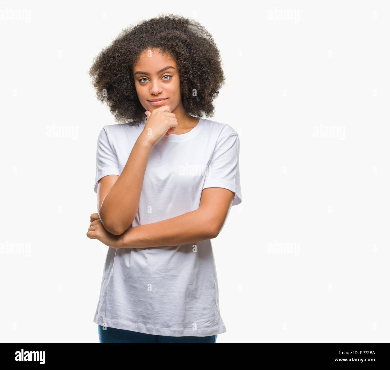 Young afro american woman over isolated background looking confident at ...