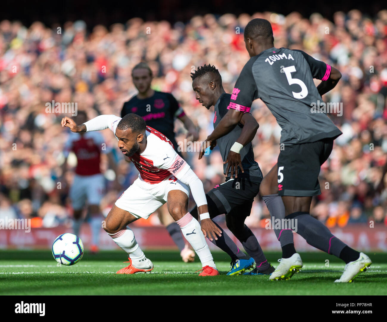 London, UK. 23rd Sep, 2018. Alexandre Lacazette (L) of Arsenal competes during the English Premier League match between Arsenal and Everton at the Emirates Stadium in London, Britain on Sept. 23, 2018. Arsenal won 2-0. Credit: Marek Dorcik/Xinhua/Alamy Live News Stock Photo
