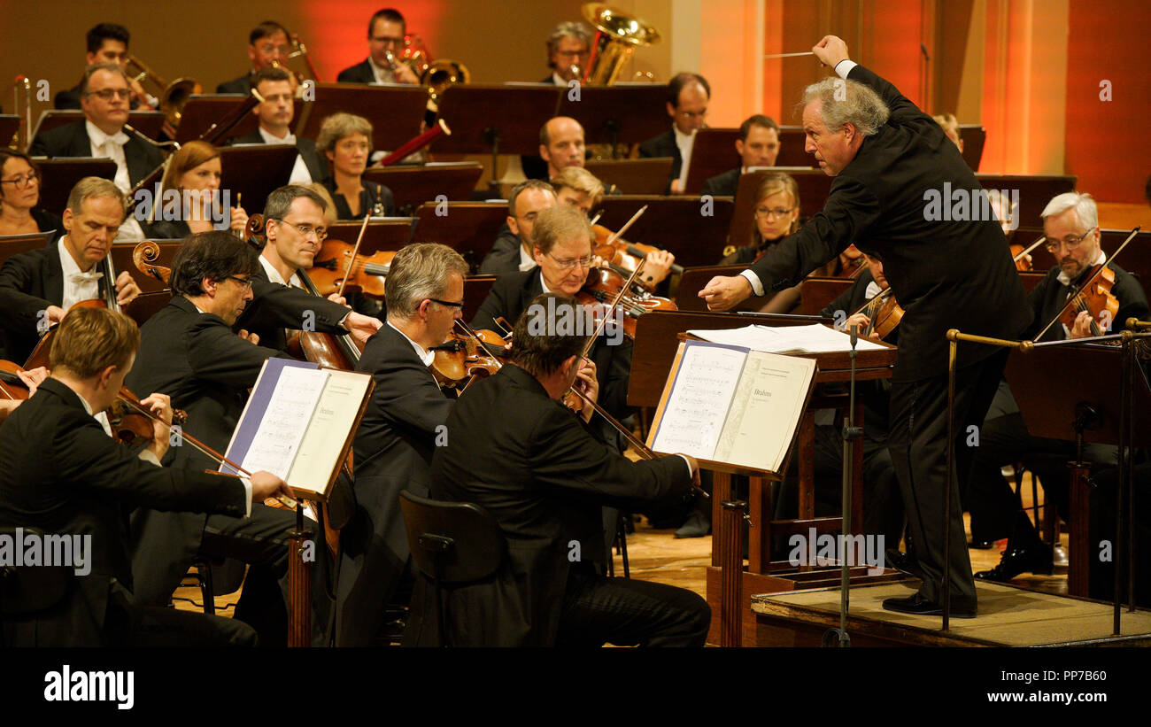 Conductor Manfred Honeck conducts Staatskapelle Dresden and Slovak Philharmonic Choir during the final concert of Dvorak Prague international music festival, in Prague, Czech Republic, on September 21, 2018. (CTK Photo/Michal Kamaryt) Stock Photo