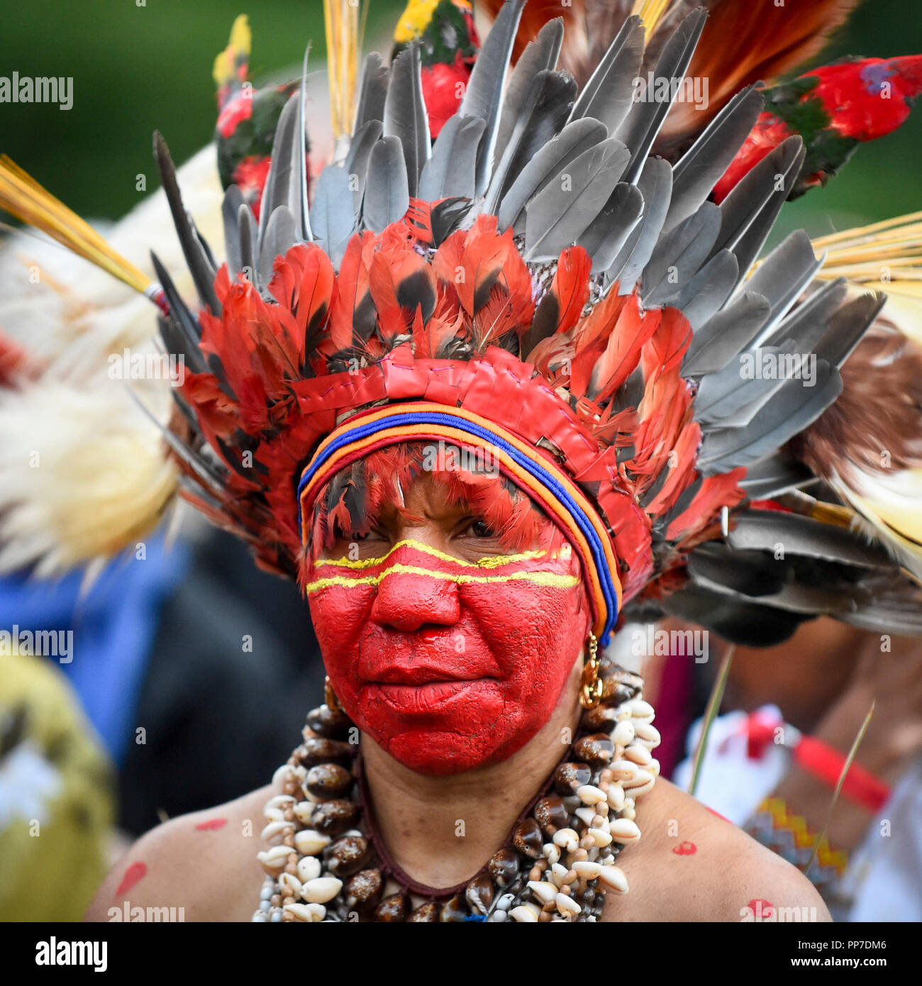 London, UK. 24 September 2018. A member from Papua New Guinea and Ngati  Ranana, the London Maori Club, take part in a ceremonial procession and  blessing ceremony for the forthcoming 