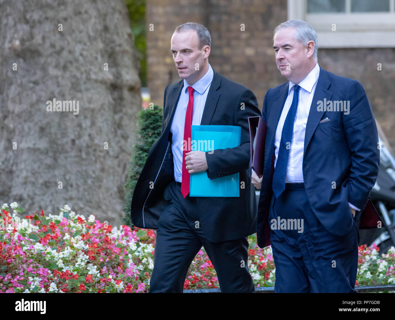 London, UK. 24th September 2018, Dominic Raab MP PC, Brexit Secretary,(left) and Geoffrey Cox QC MP Attorney General , arrives at a Cabinet meeting at 10 Downing Street, London, UK. Credit Ian Davidson/Alamy Live News Stock Photo