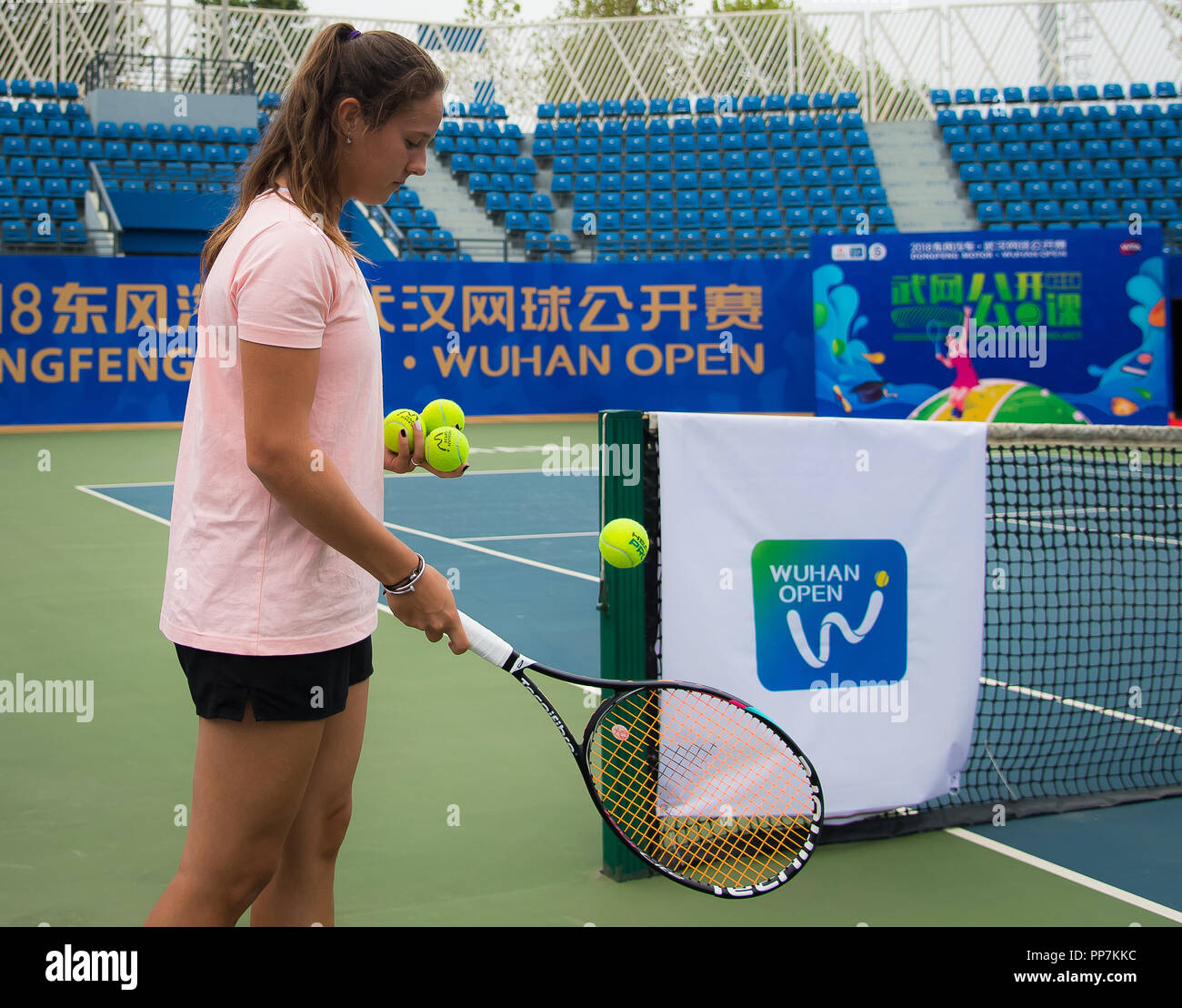 Wuhan, China. 24th Sep, 2018. Wuhan, China. September 24, 2018 - Daria  Kasatkina of Russia hits balls with sponsor guests at the 2018 Dongfeng  Motor Wuhan Open WTA Premier 5 tennis tournament