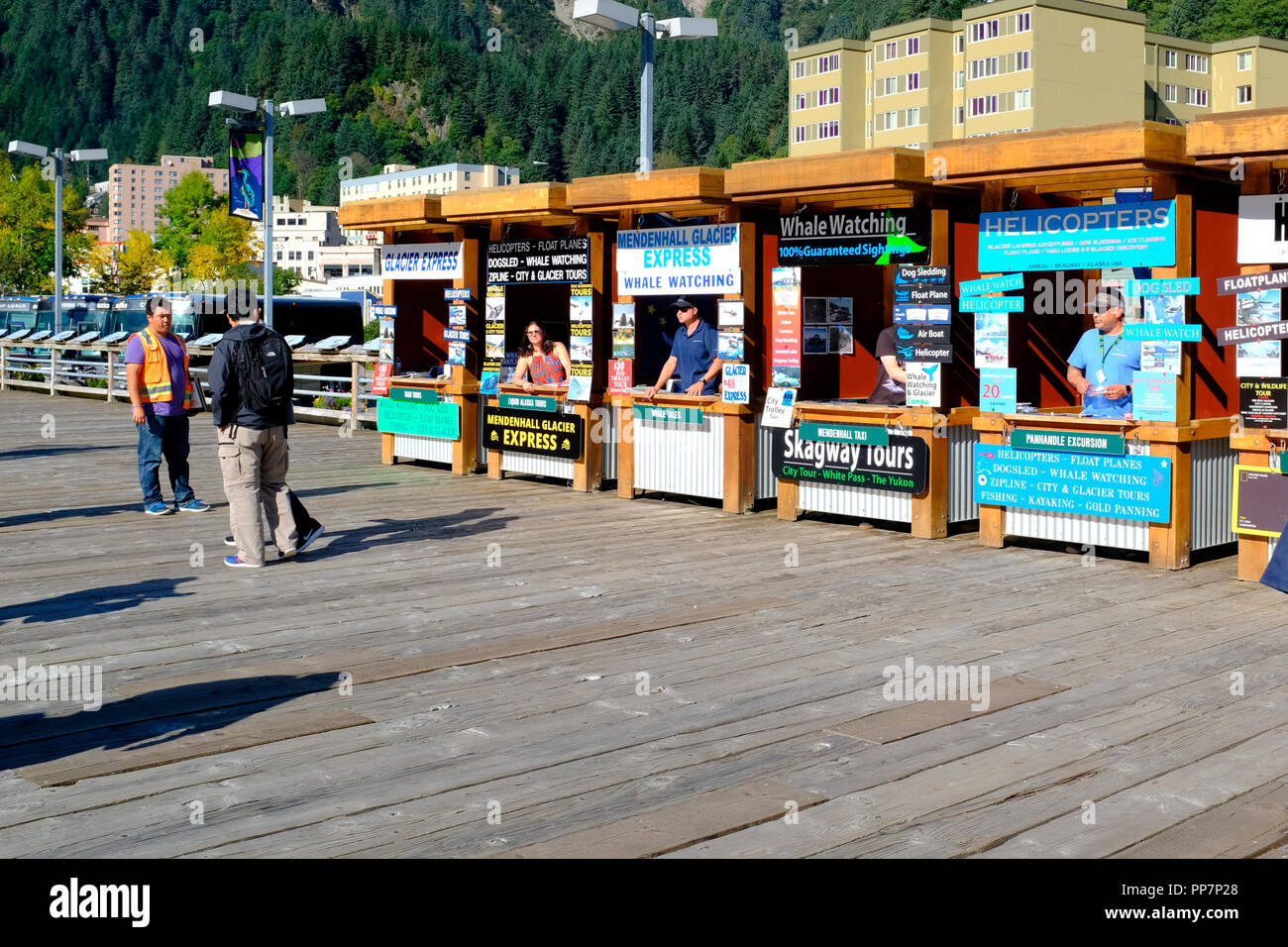Booths outside of cruise ship area, selling excursions, in Juneau, Alaska Stock Photo