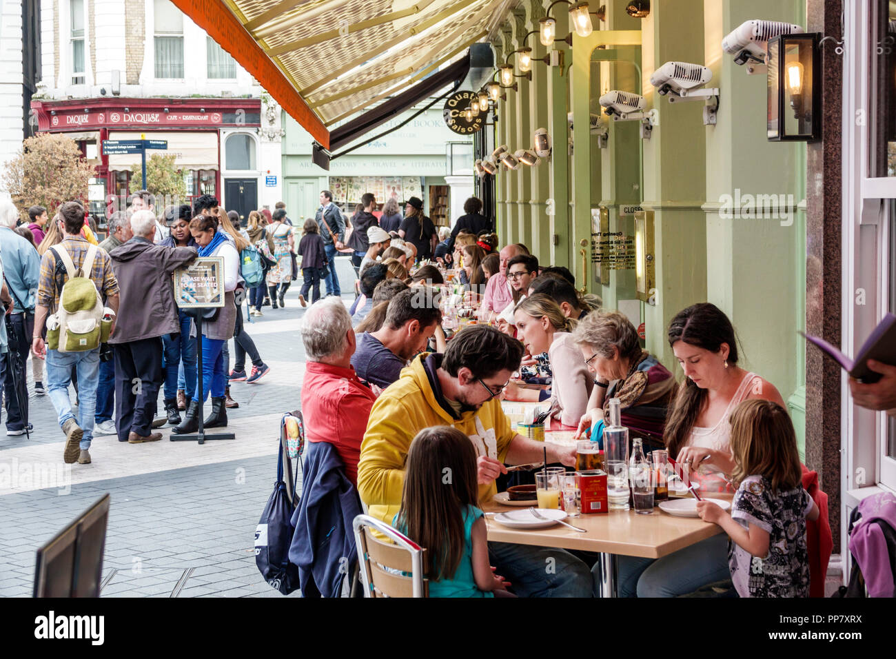 London England,UK Kensington,Road,Comptoir Libanais,restaurant restaurants food dining cafe cafes,Lebanese food,al fresco,sidewalk outside tables dini Stock Photo