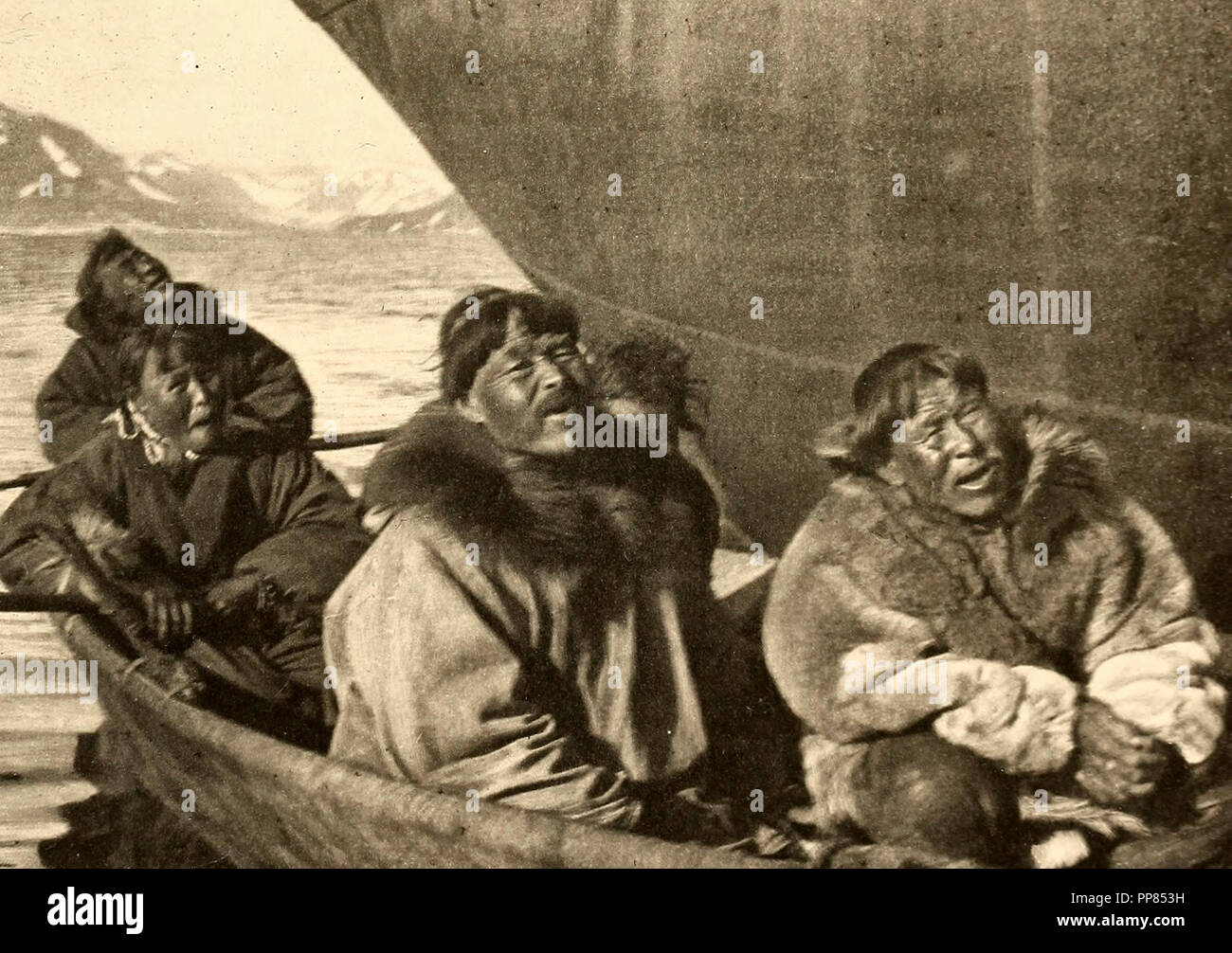 Eskimos alongside a ship, Plover Bay, Siberia, circa 1900 Stock Photo