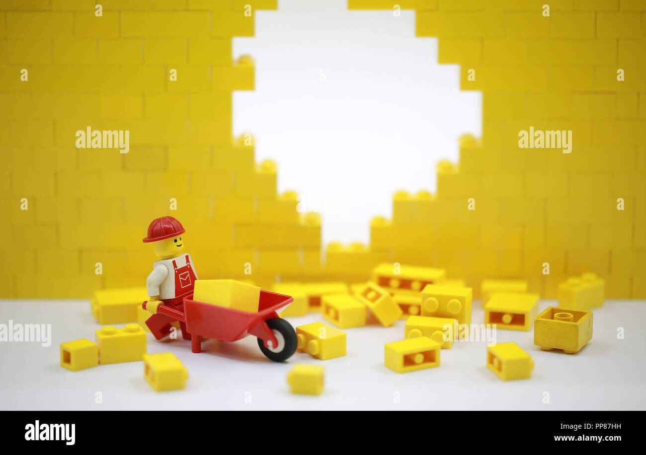 lego worker with the wall Stock Photo