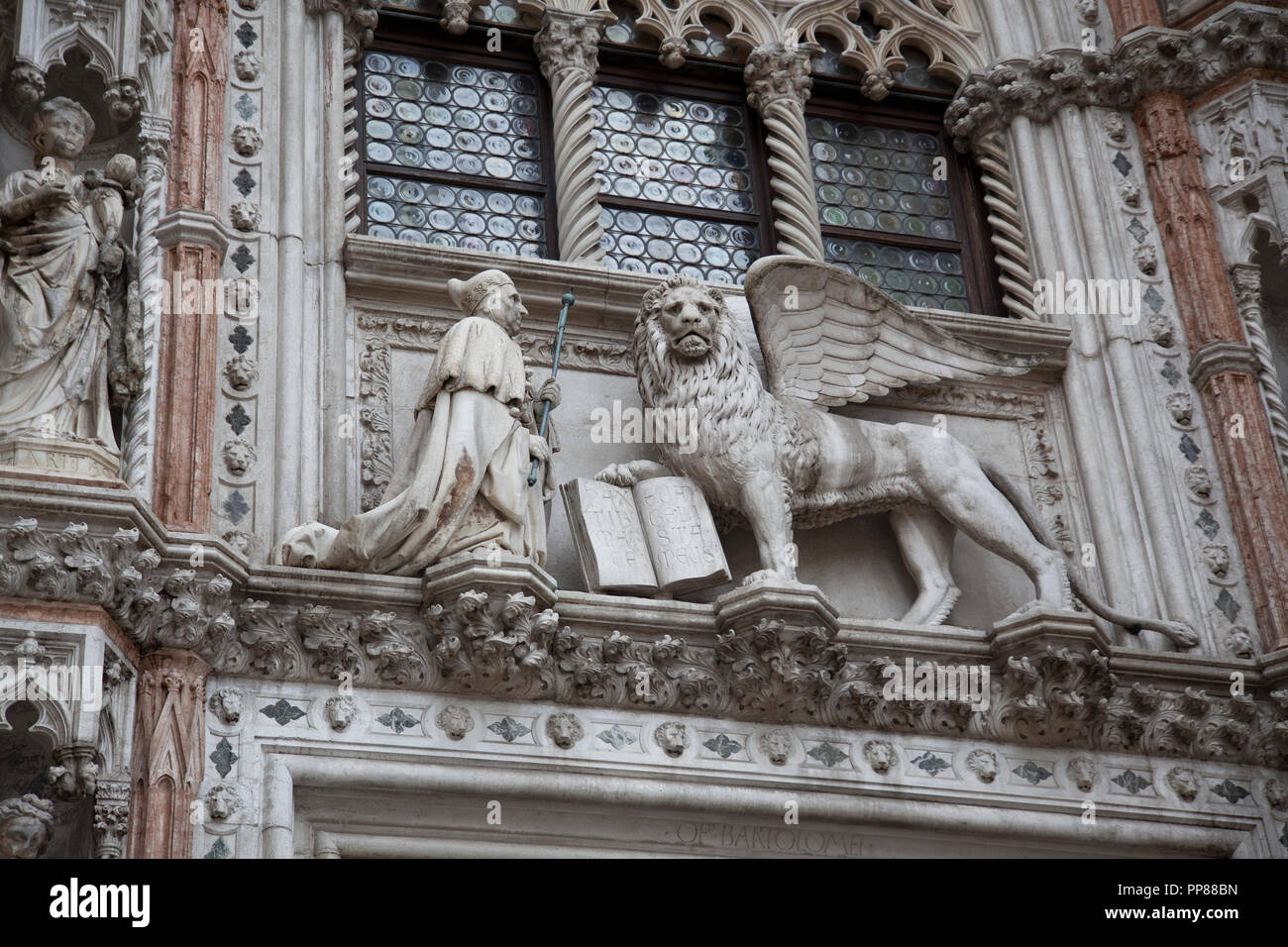 The winged lion of St Mark. Inscription: PAX TIBI MARCE EVANGELISTA MEVS The Lion of Saint Mark, representing the evangelist St Mark, pictured in the  Stock Photo