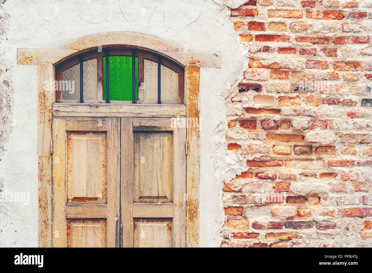 old wood windows on brick wall Stock Photo - Alamy