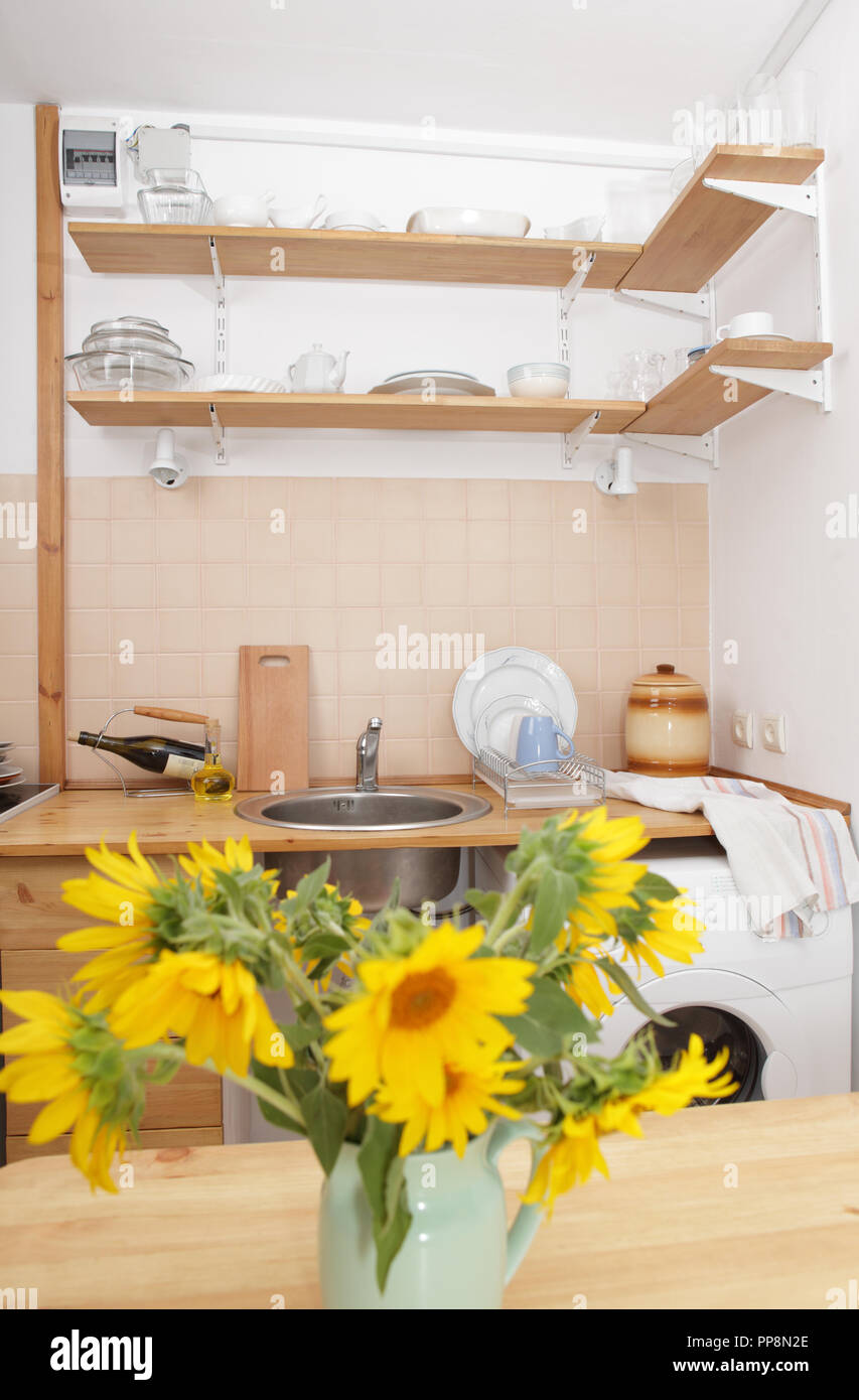 Interior of a kitchen with wooden furniture Stock Photo - Alamy