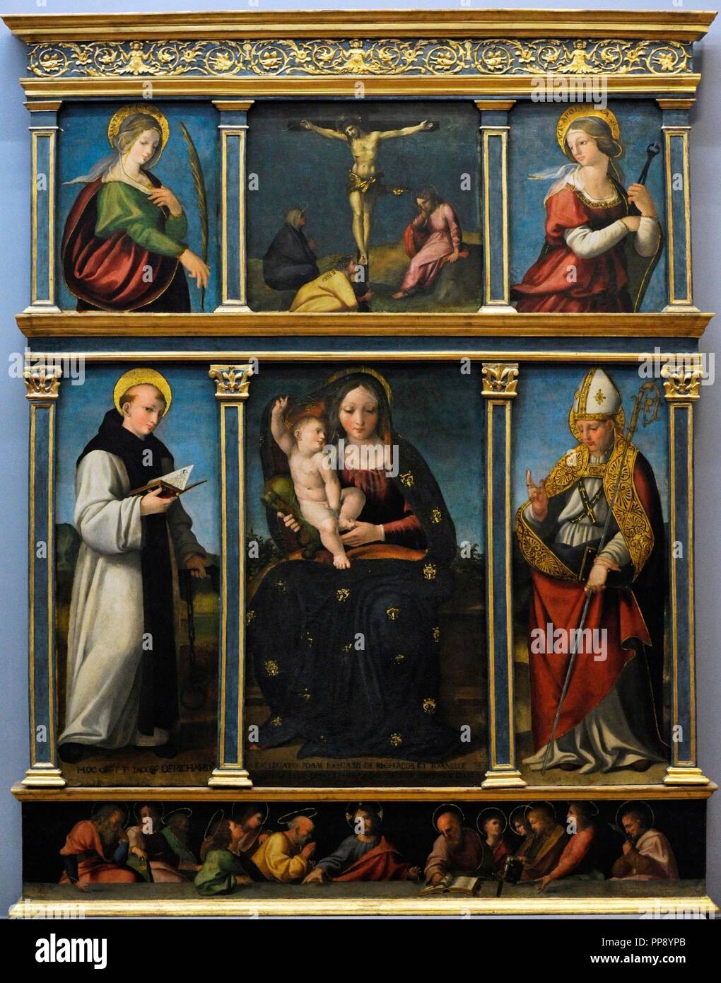 Agostino Tesauro (active 1541-1546). Italian painter. Top: Crucifixion between Saint Venera and Saint Apollonia. Bottom part: Virgin and Child between Saint Leonard and Saint Donatus. In the predella, Christ among the apostles, 1521. Bourbon Collection. National Museum of Capodimonte. Naples. Italy. Stock Photo