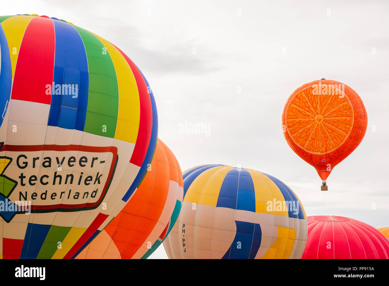 Putting up of hot air balloons at the 28th Warsteiner Internationale Montgolfiade, 2018 in Warstein, Germany, for the last mass start of the WIM, Stock Photo