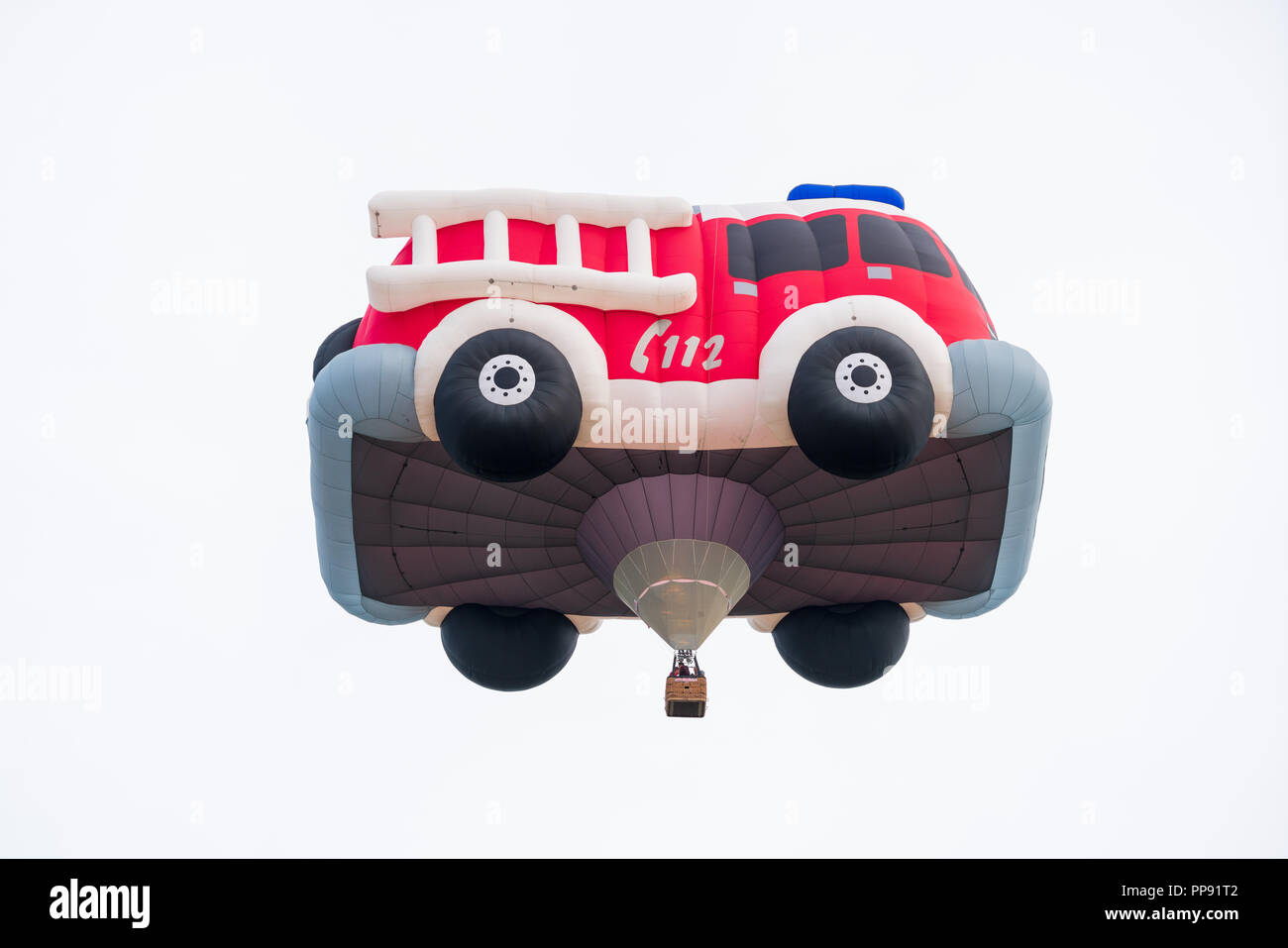 Hot air balloon, special form fire engine advertising the German emergency number 112, (equivalent to 911), at WIM 2018 Stock Photo