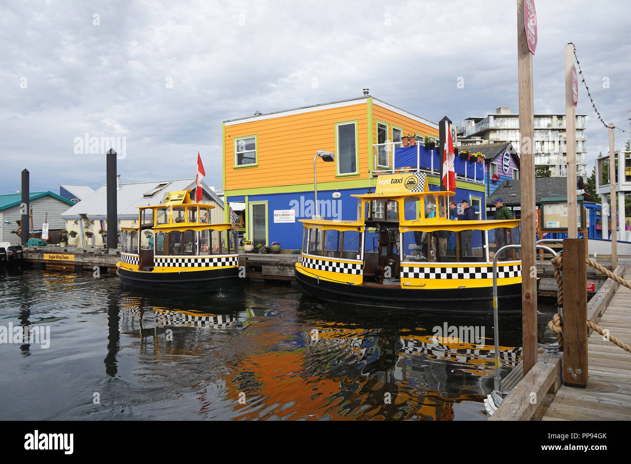 Water taxi's at Fisherman's Wharf , Victoria, Vancouver Island Stock Photo