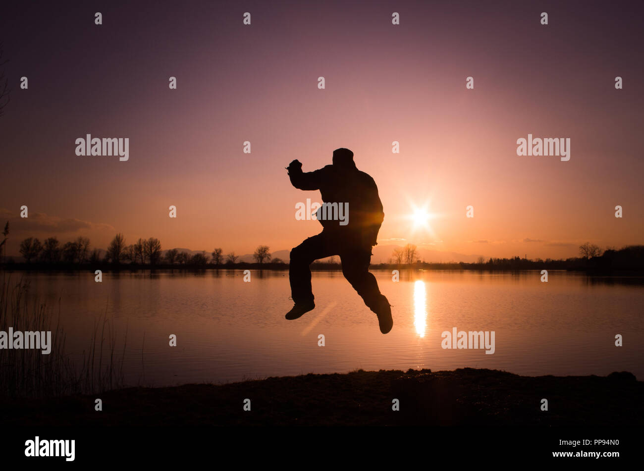 Silhouette man jumping hi-res stock photography and images - Alamy