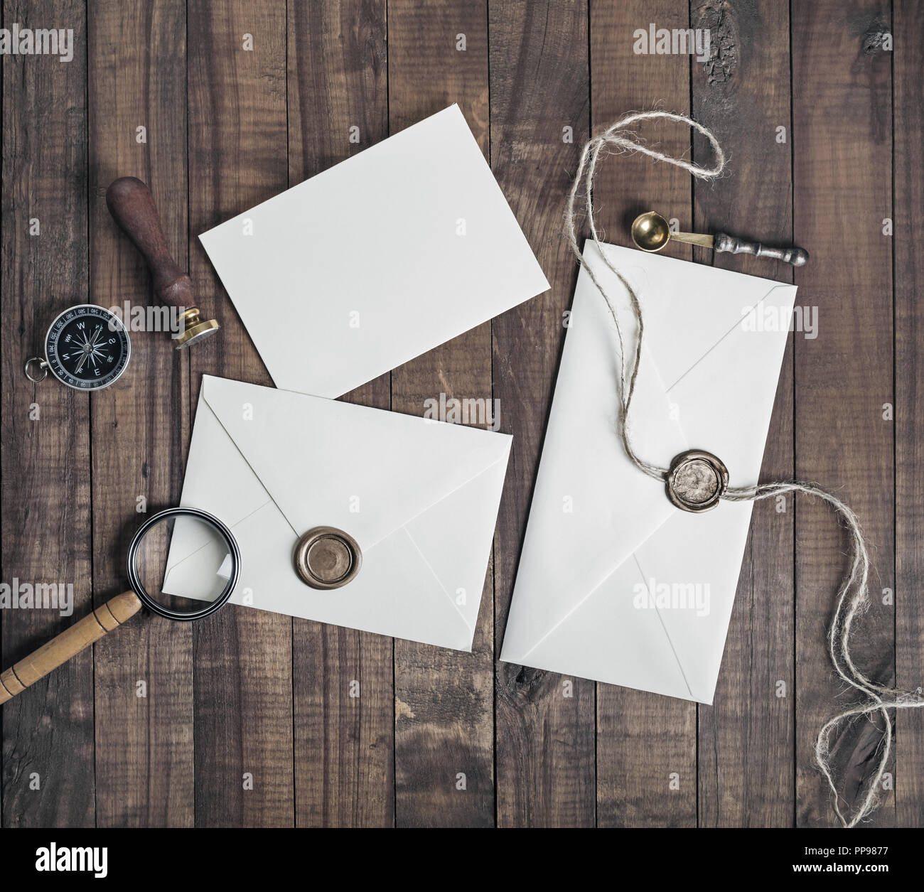 Download Photo Of Blank Paper Envelopes With Wax Seal Stamp And Stationery On Vintage Wood Background Responsive Design Mockup Flat Lay Stock Photo Alamy