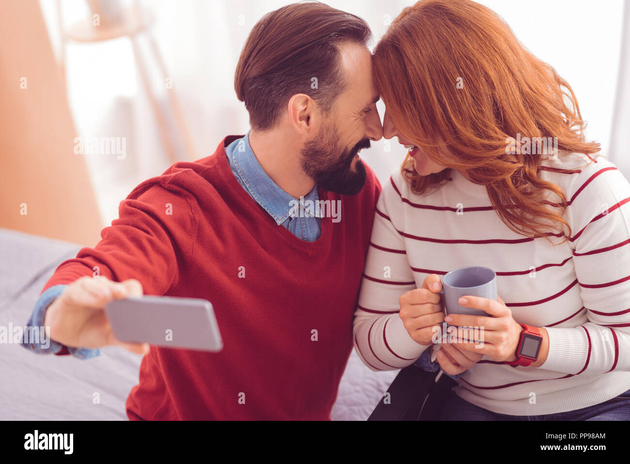 Cheerful loving couple expressing their emotions Stock Photo Alamy