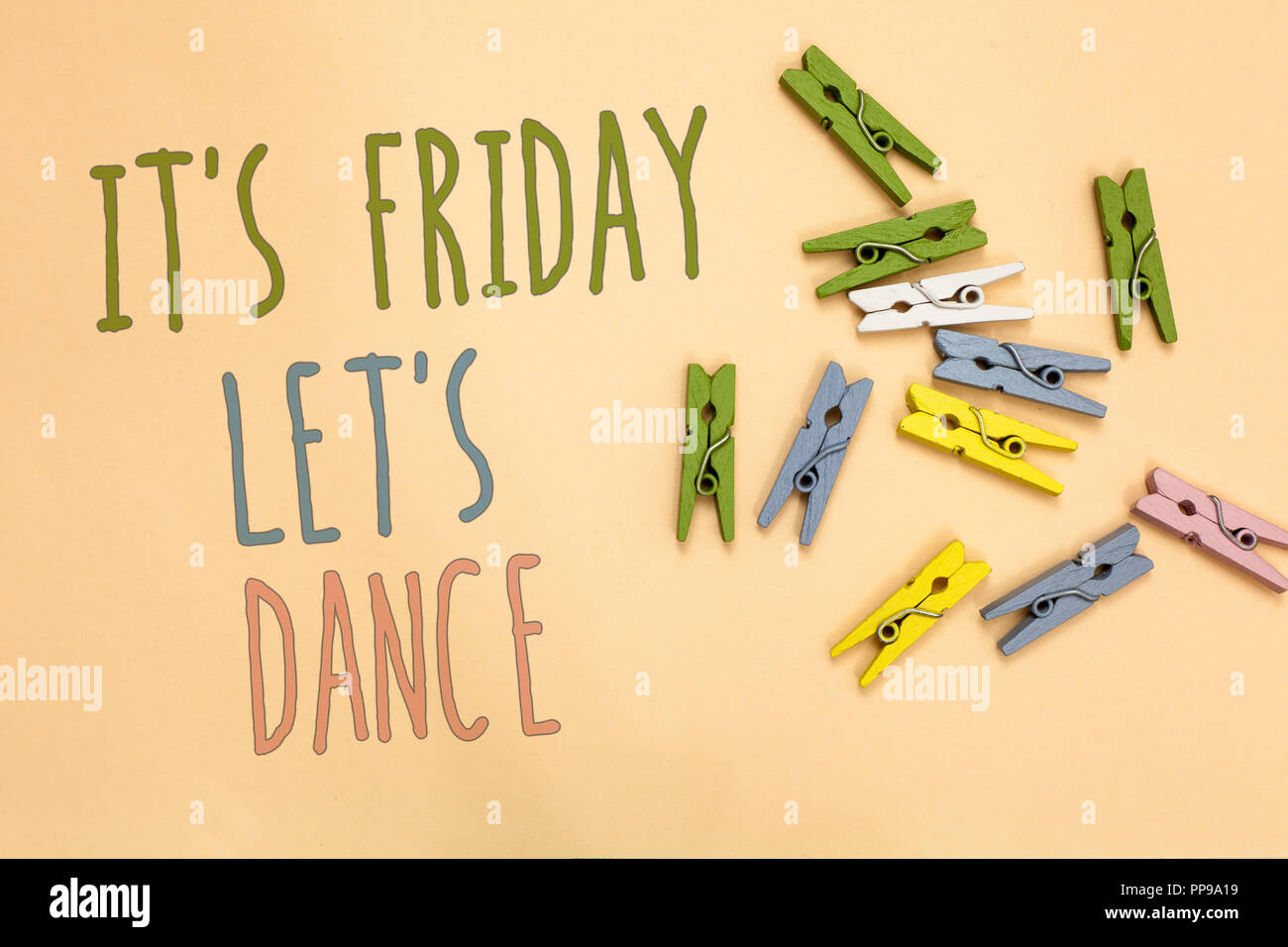 Text sign showing It s is Friday Let s is Dance. Conceptual photo Celebrate starting the weekend Go party Disco Music Yellow base with painted texts c Stock Photo