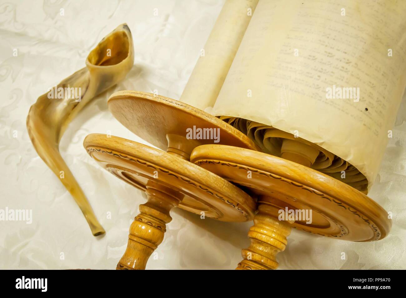Torah scrolls and a "shofar" musical horn, both used in the Jewish