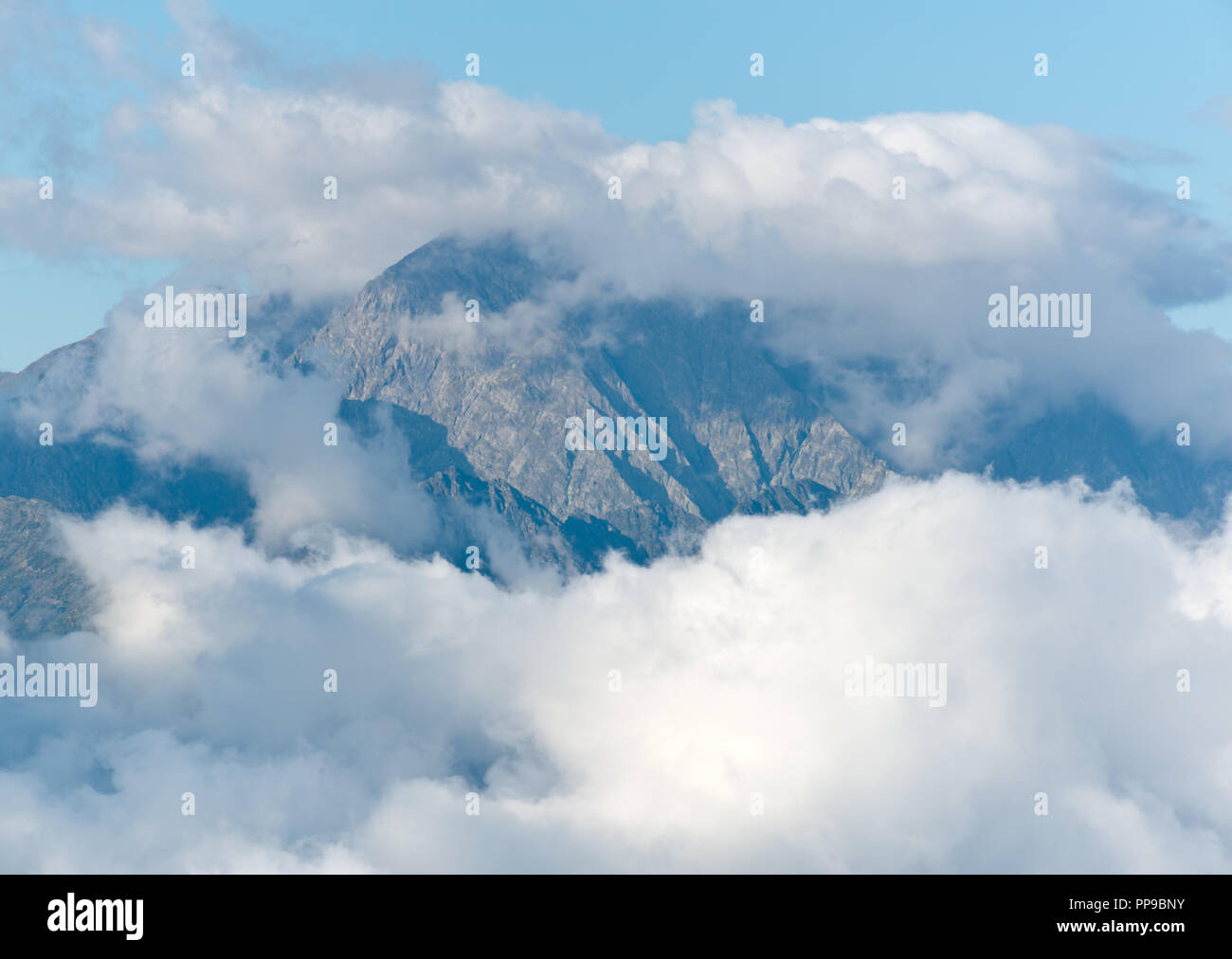 Beautiful clouds over mountains hi-res stock photography and images - Alamy