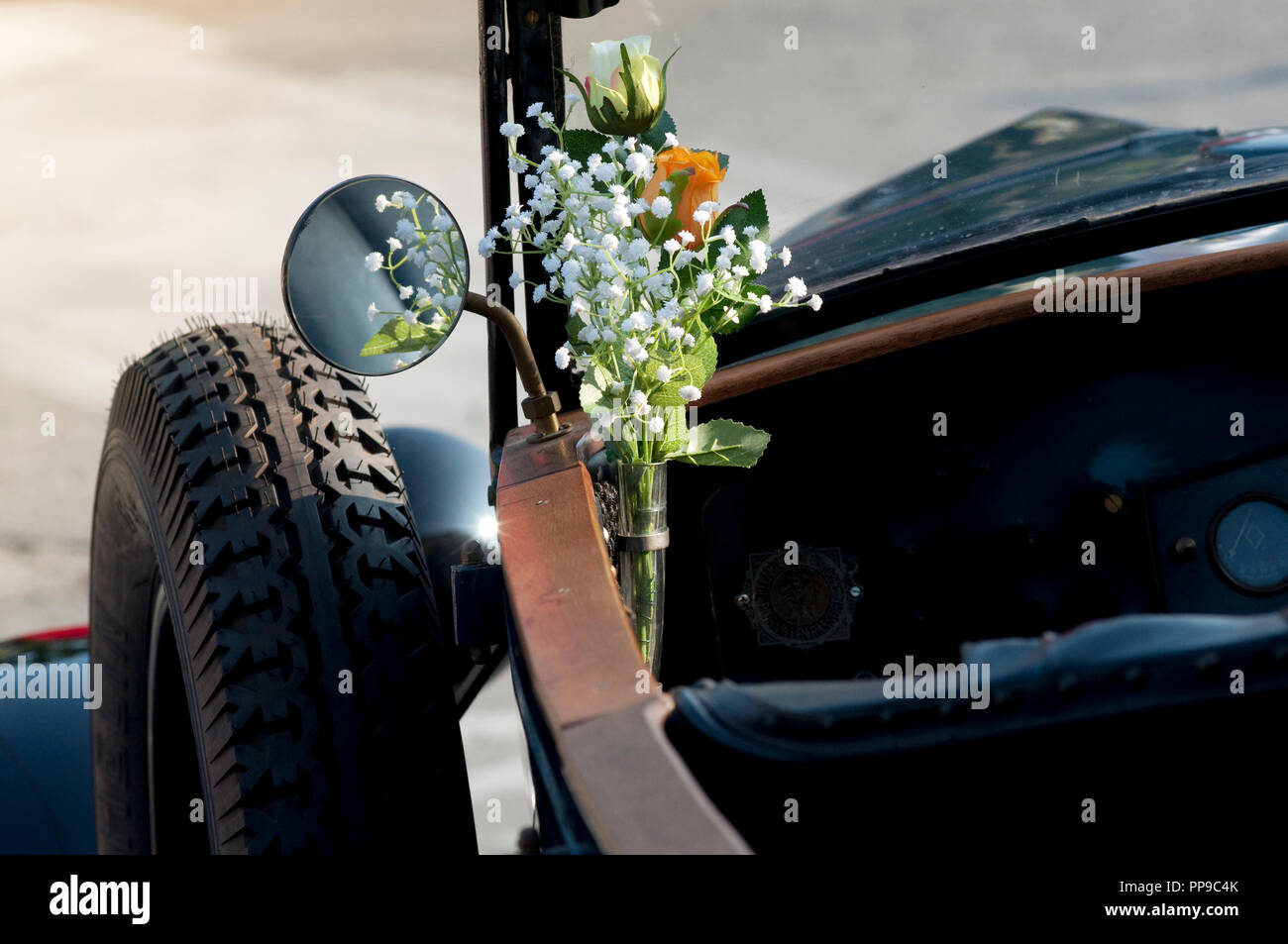 Classic Car with Flowers Stock Photo - Alamy