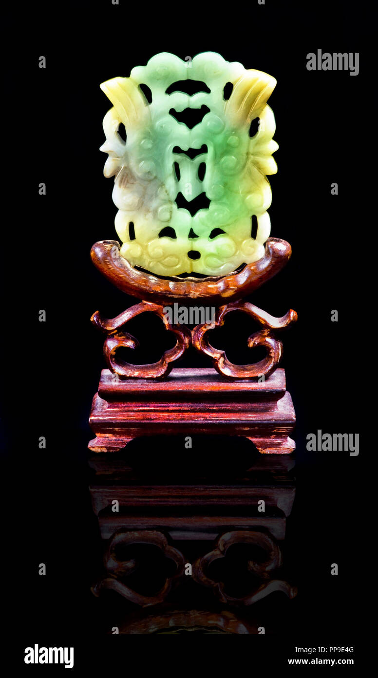 Antique Chinese green and yellow jade screen made in the 1800's. Stock Photo