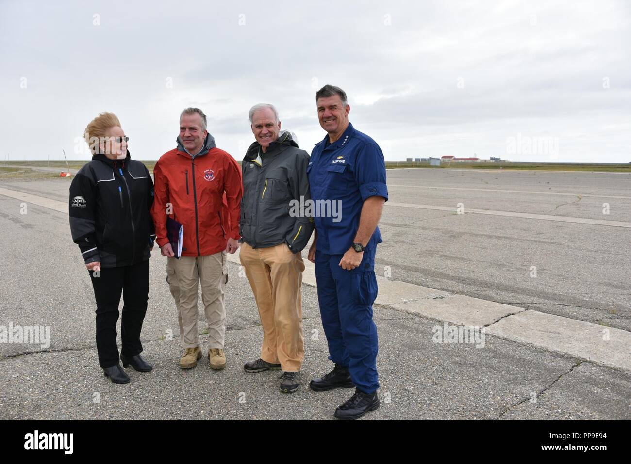 Coast Guard Commandant Adm. Karl Schultz meets with Secretary of the Navy Richard V. Spencer and Alaska Sen. Dan Sullivan in Nome and Port Clarence, Alaska to discuss the construction of deep draft ports in western Alaska, Aug. 13, 2018. This would allow the Coast Guard and Navy to have a strong presence in the U.S. Arctic. Stock Photo