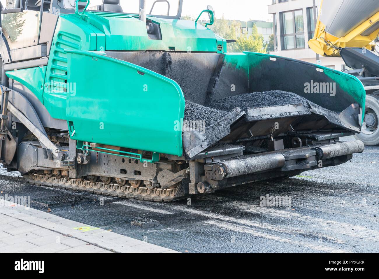 Dump truck asphalt paver road hires stock photography and images Alamy