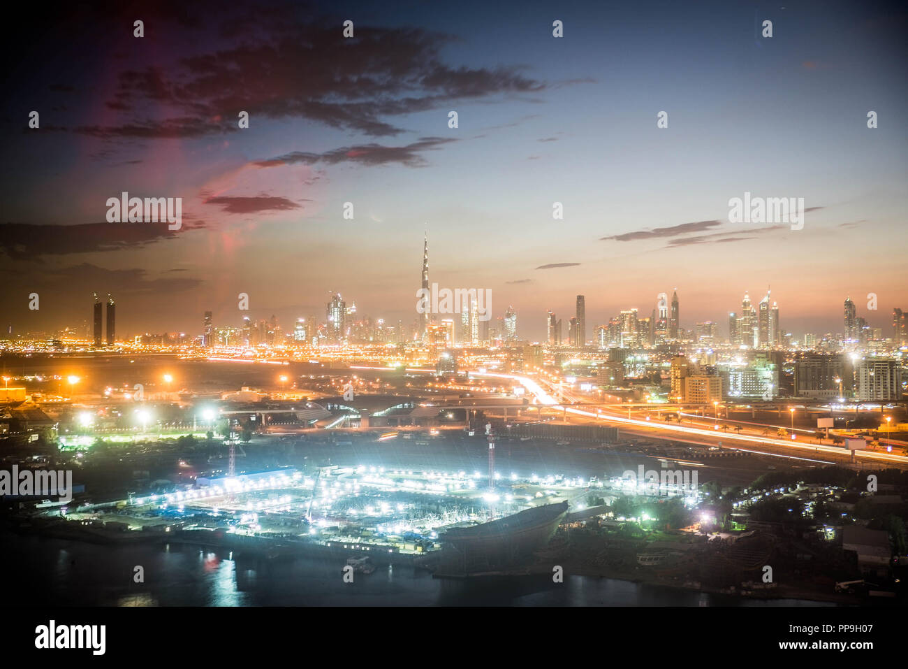 Dubai skyline at sunset Stock Photo - Alamy
