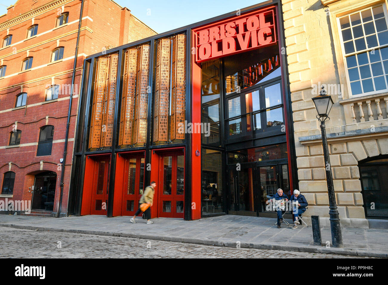 People wait outside the newly renovated Bristol Old Vic theatre in ...