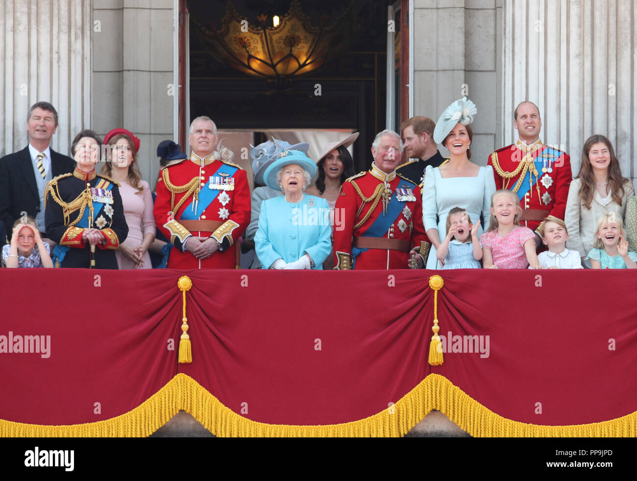 (left to right) Vice Admiral Sir Timothy Laurence, the Princess Royal, Princess Beatrice, Lady Louis Windsor, Duke of York, , Queen Elizabeth II, Duchess of Sussex, Prince of Wales, Duke of Sussex and the Duke and Duchess of Cambridge with Princess Charlotte, Savannah Phillips and Prince George, on the balcony of Buckingham Palace, in central London, following the Trooping the Colour ceremony at Horse Guards Parade as the Queen celebrates her official birthday. Stock Photo