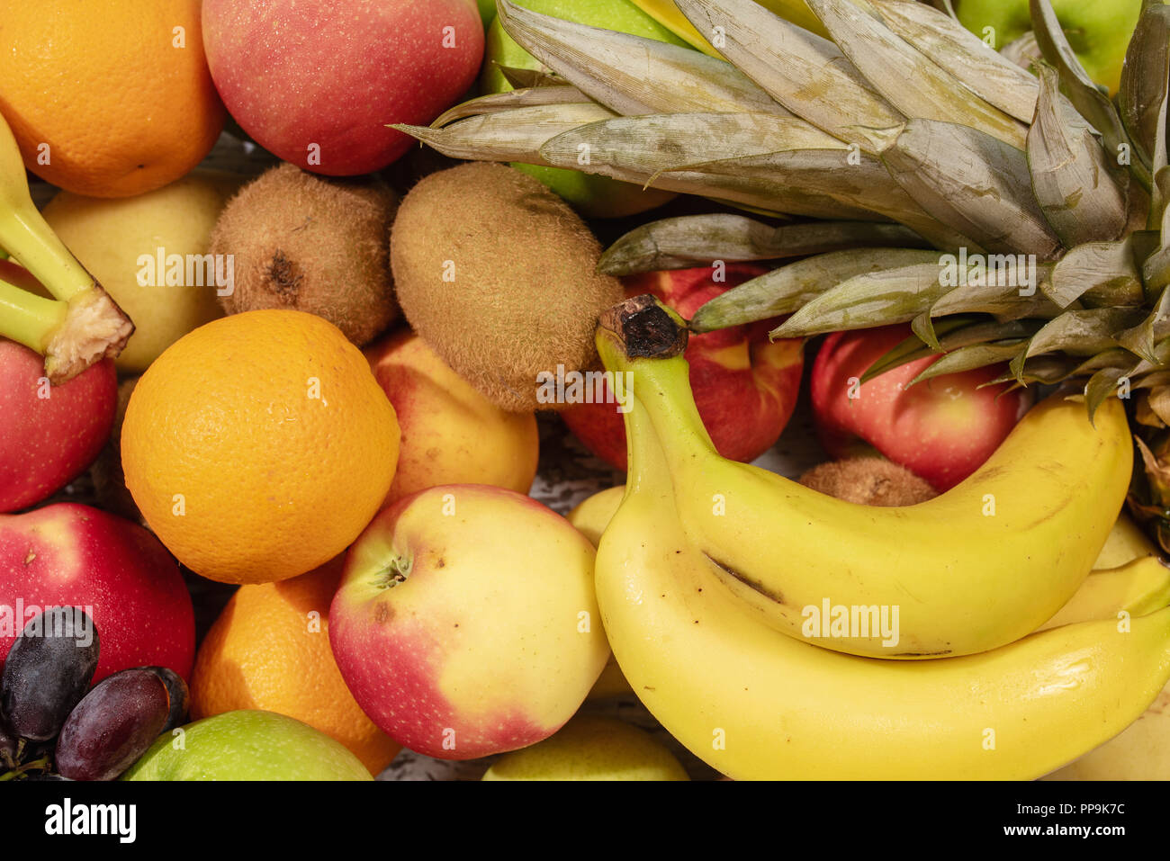 Background from many different exotic fruits.Banana,kiwi,orange. Stock Photo
