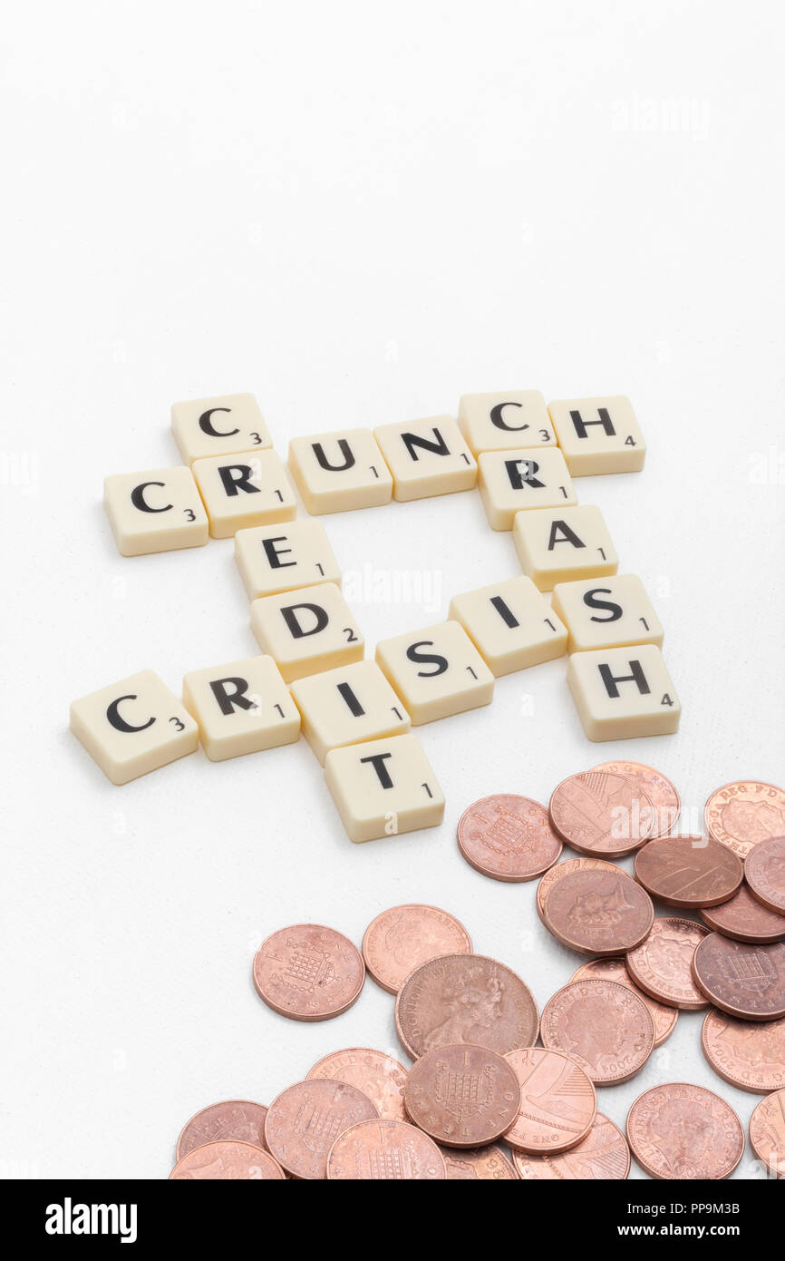Letter tiles spelling out aspects of personal finances / financial management, financial crisis, running up bills, debts, personal loans etc. Stock Photo
