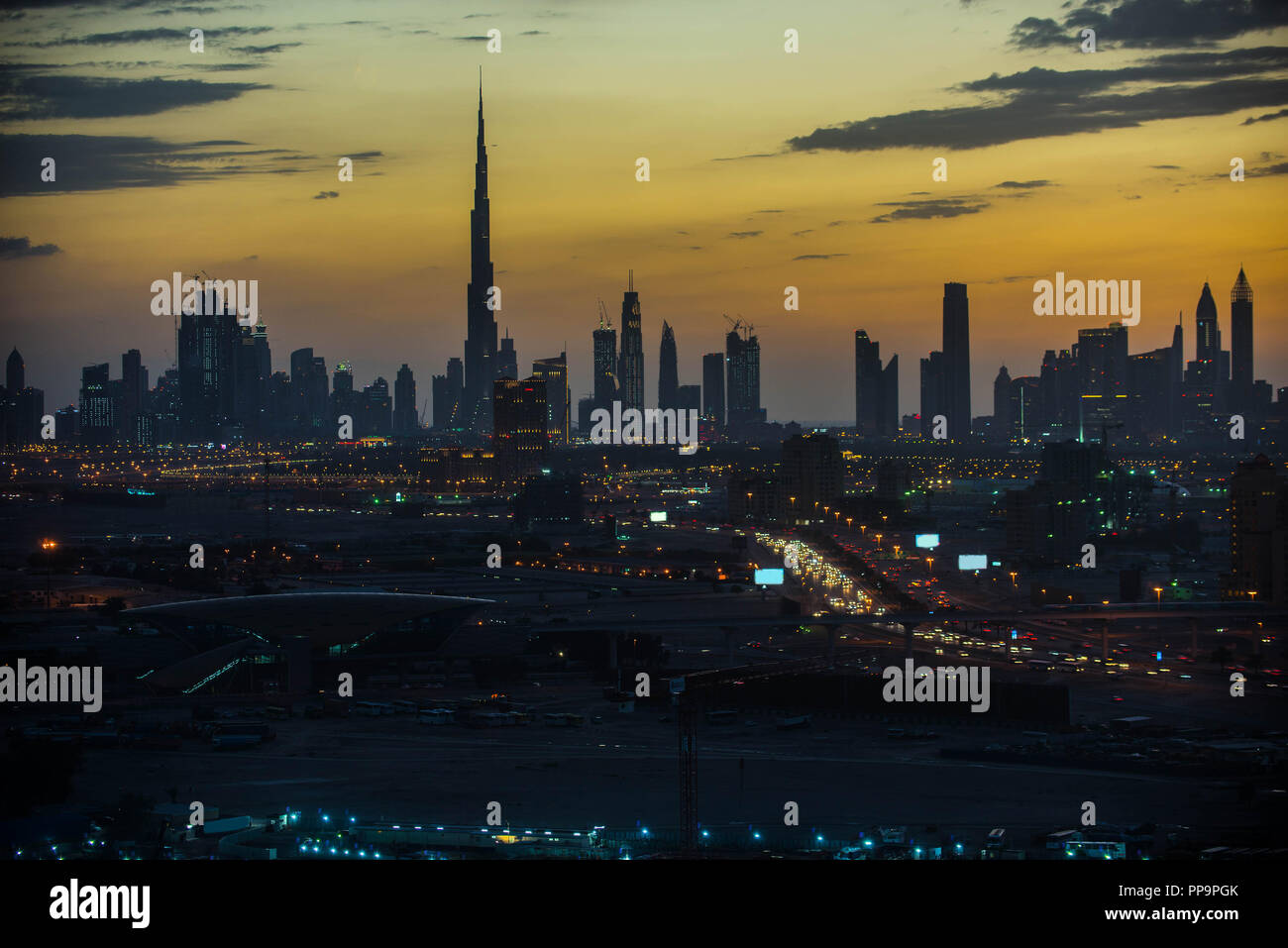 Dubai skyline at sunset Stock Photo - Alamy